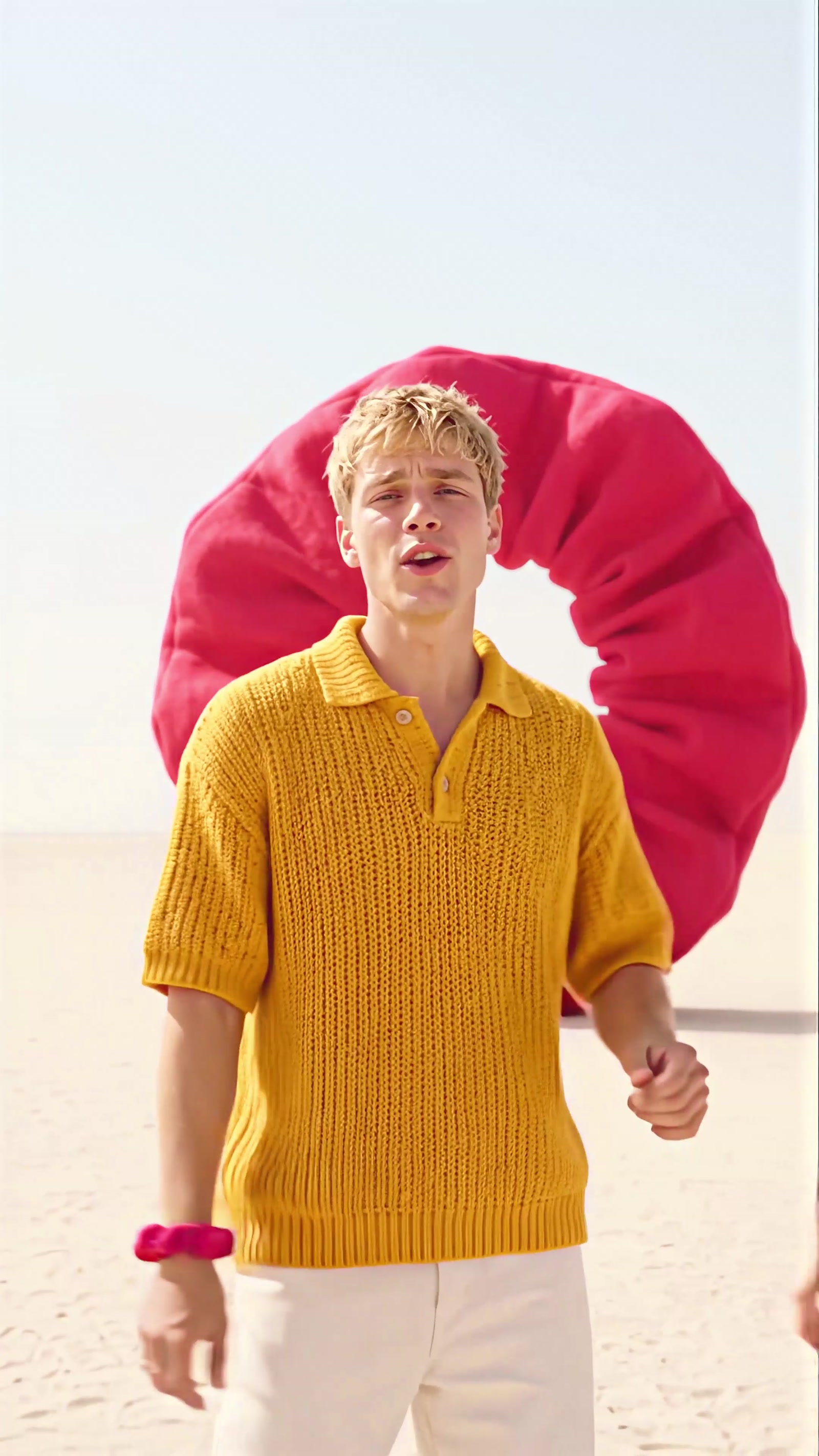 Frame from the finished video showing the same man and the same wardrobe